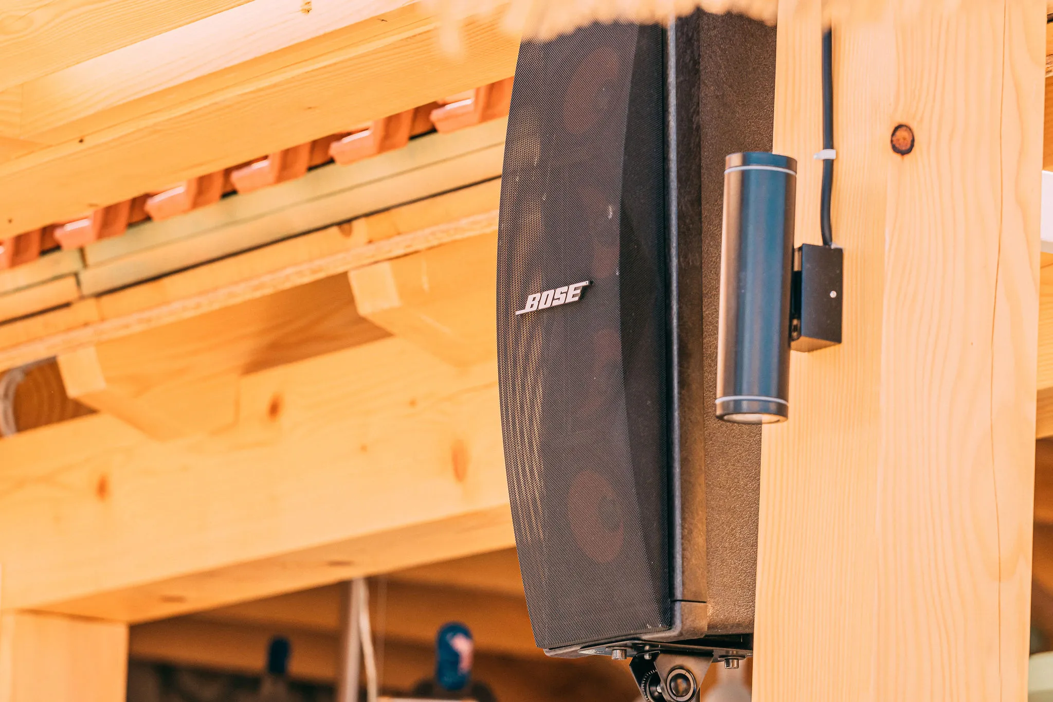 Close-up of a Bose speaker at Haven Beach Bar — Cosmic Production outdoor AV setup