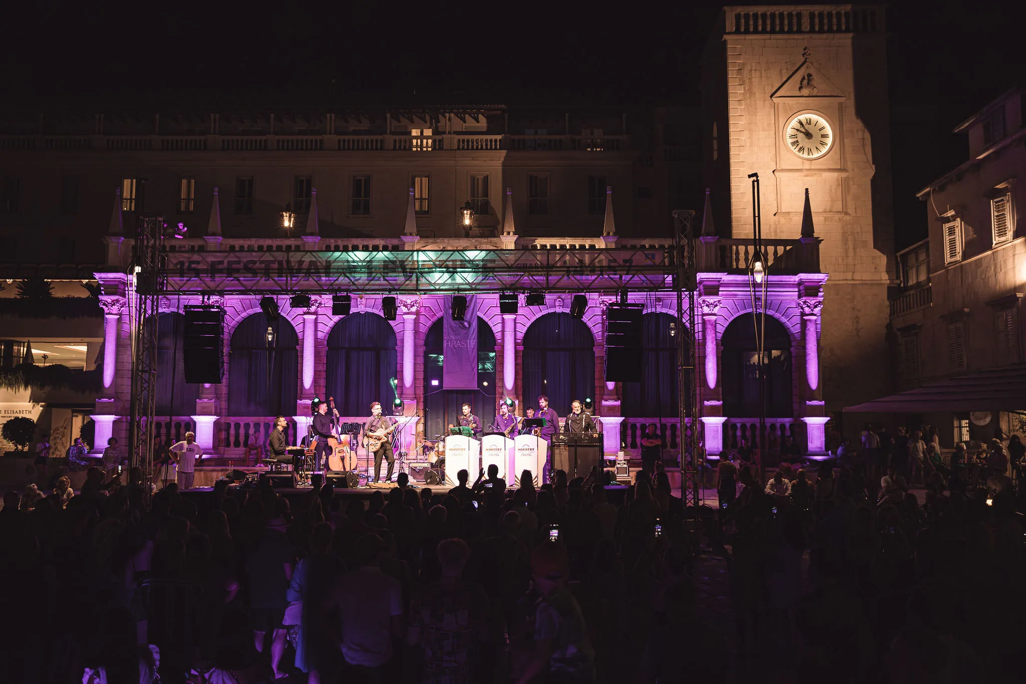 Live band performing on stage with purple lighting at Hvar Loggia — Cosmic Production event