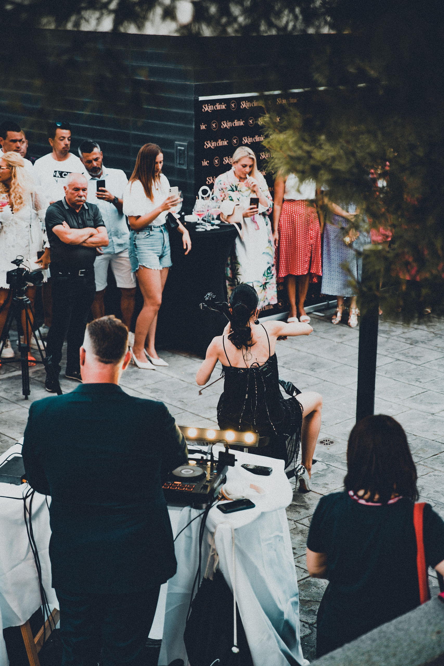 Corporate brand event with a DJ and guests